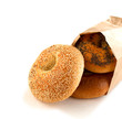 Assorted bagels in brown paper bag