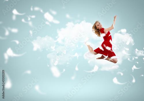 Photo: Young girl floating Young girl floating