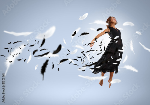 Photo: Young girl floating Young girl floating