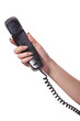 Hand holding an old black telephone tube