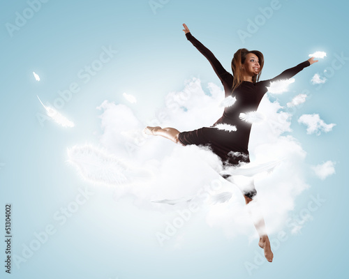 Photo: Young girl floating Young girl floating