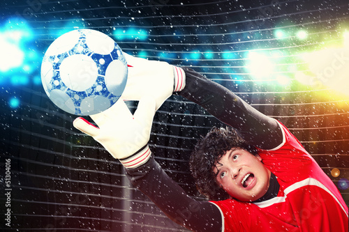 Photo: Goalkeeper catches the ball Goalkeeper catches the ball