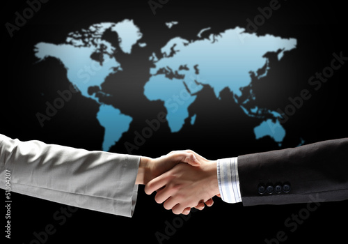 Photo: image of business handshake image of business handshake