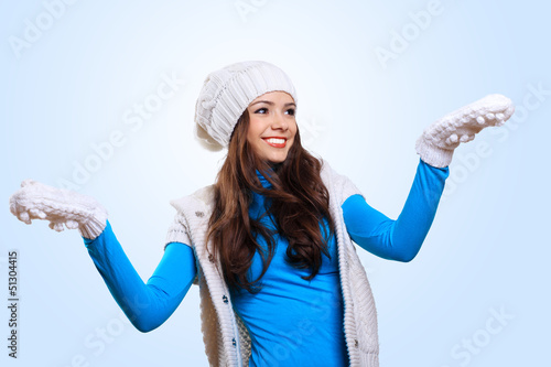 Photo: Young woman wearing warm sweater Young woman wearing warm sweater