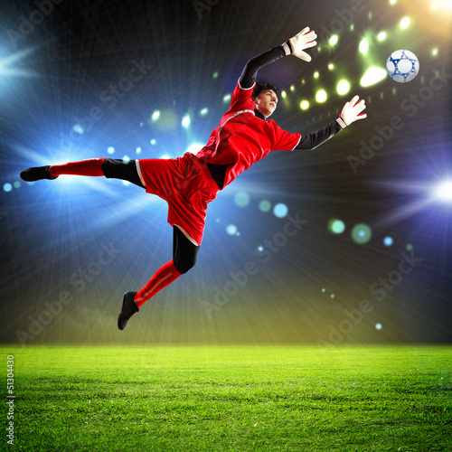 Photo: Goalkeeper catches the ball Goalkeeper catches the ball