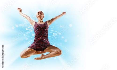 Photo: Girl in color dress dancing.Collage Girl in color dress dancing.Collage