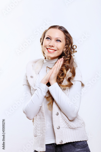 Photo: Young woman wearing warm sweater Young woman wearing warm sweater