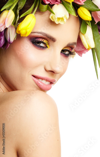 Photo: beauty woman portrait with wreath from flowers on head over whit beauty woman portrait with wreath from flowers on head over whit