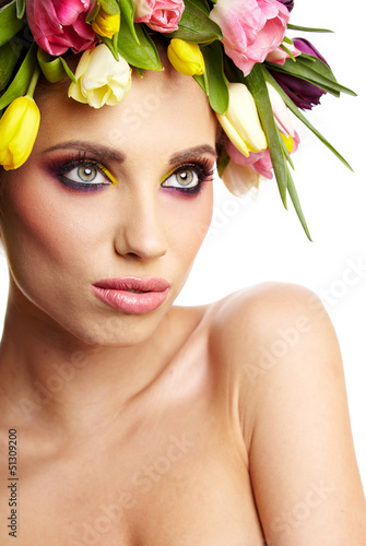Photo: beauty woman portrait with wreath from flowers on head over whit beauty woman portrait with wreath from flowers on head over whit