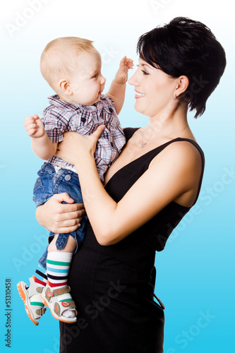 Photo: Beautiful happy mather with attractive baby boy Beautiful happy mather with attractive baby boy