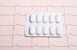 EKG chart with pills