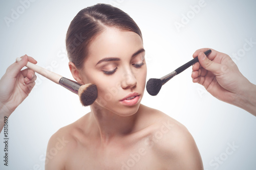 Photo: Portrait of the woman making make-up Portrait of the woman making make-up