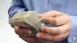 Video: Businessman counts money in hands. Businessman counts money in hands.
