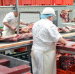 Metzger im Schlachthof // butcher in slaughterhouse