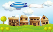 An airship above the neighborhood with a banner