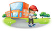 A boy holding a gadget near the school