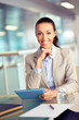 Photo: Businesswoman with touchpad Businesswoman with touchpad