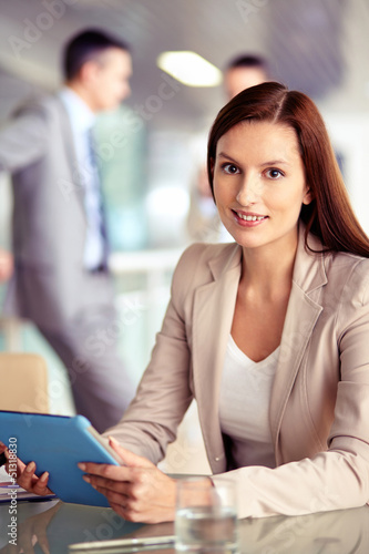 Photo: Female with touchpad Female with touchpad