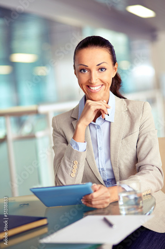 Photo: Businesswoman with touchpad Businesswoman with touchpad