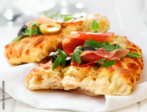 Photo: Delicious focaccia bread with ham and rocket Delicious focaccia bread with ham and rocket
