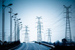 High voltage towers at sunset