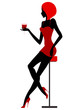Girl sits in bar with glass in hand
