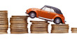 Auto und Geld. Modellauto auf Münzen