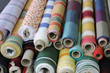 some rolls of textile on the market