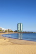 beautiful beach in Arrecife with the town in the background