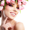 Beautiful young woman with flower