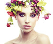 Beautiful young woman with flower