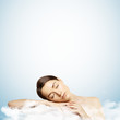 pretty young girl sleeping on a cloud
