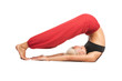 Practicing Yoga. Young woman isolated on white background
