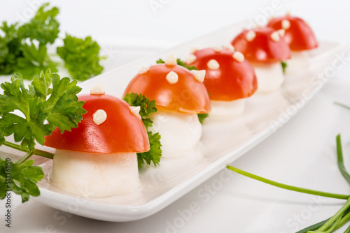 Photo: Funghetti di mozzarella e pomodoro, antipasto Funghetti di mozzarella e pomodoro, antipasto