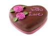 Foto: Chocolate Cake heart shape with icing sugar flowers. Chocolate Cake heart shape with icing sugar flowers.