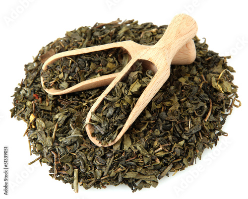 Photo: aromatic green dry tea, isolated on white aromatic green dry tea, isolated on white