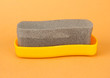 Photo: Shoe shine sponge, on color background Shoe shine sponge, on color background