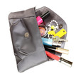Items contained in the women's handbag isolated on white