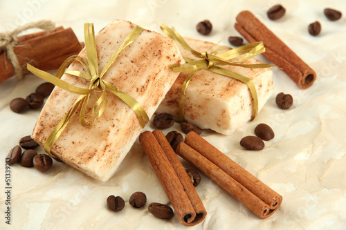 Photo: Natural handmade soap, on beige background Natural handmade soap, on beige background