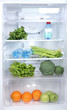 Open refrigerator with vegetarian food