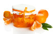 Orange jam with zest and tangerines, isolated on white