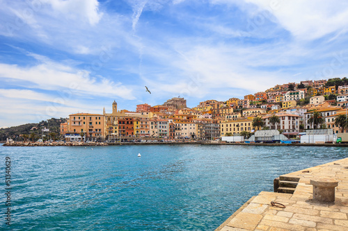 Photo: Porto Santo Stefano seafront and village. Argentario, Italy Porto Santo Stefano seafront and village. Argentario, Italy