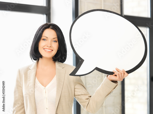 Photo: smiling businesswoman with blank text bubble smiling businesswoman with blank text bubble