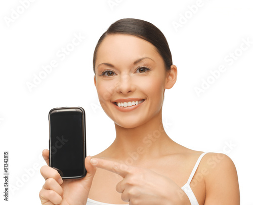 Photo: woman pointing at smartphone with sport app woman pointing at smartphone with sport app