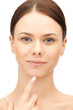 woman touching her chin