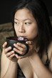 Photo: Beautiful Young Woman with Brown Hair and Eyes with Black Coffee Beautiful Young Woman with Brown Hair and Eyes with Black Coffee