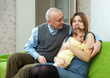 Family of three with newborn baby