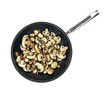 Mushrooms sauteing in skillet