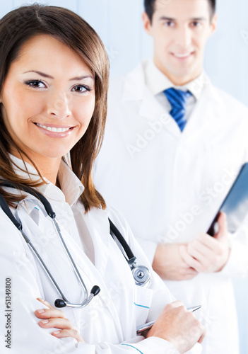 Photo: Portrait of happy smiling medical people at office Portrait of happy smiling medical people at office