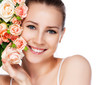 portrait of attractive smiling woman blond with roses